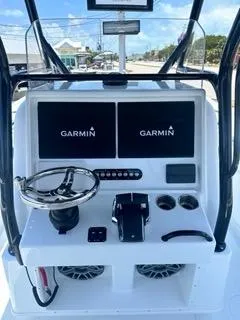  Yacht Photos Pics 2024 Yellowfin 32CC Offshore boat console with Garmin navigation screens.