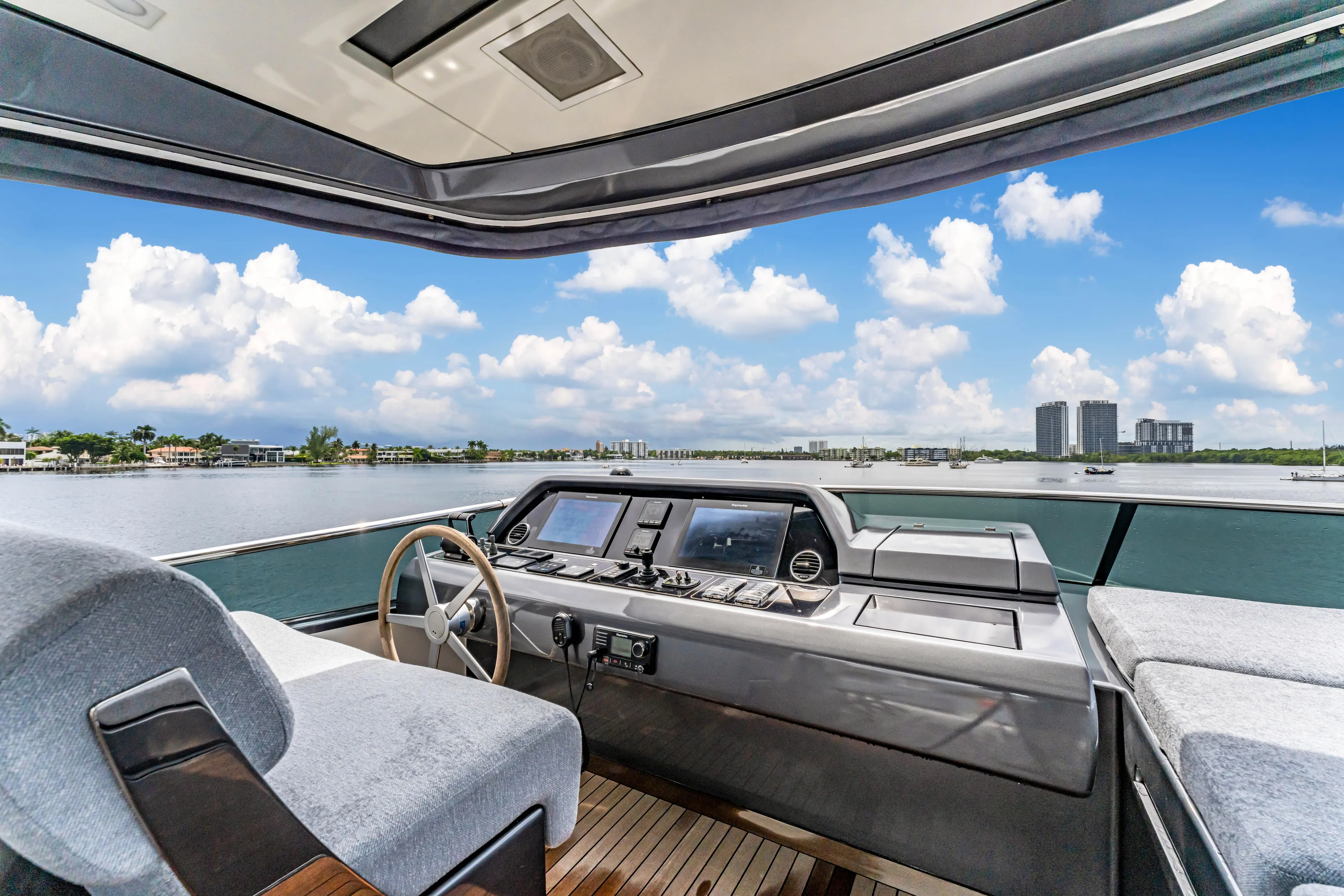 Sand Yacht Photos Pics Sanlorenzo SL78 2018 yacht helm with panoramic water view and modern controls.