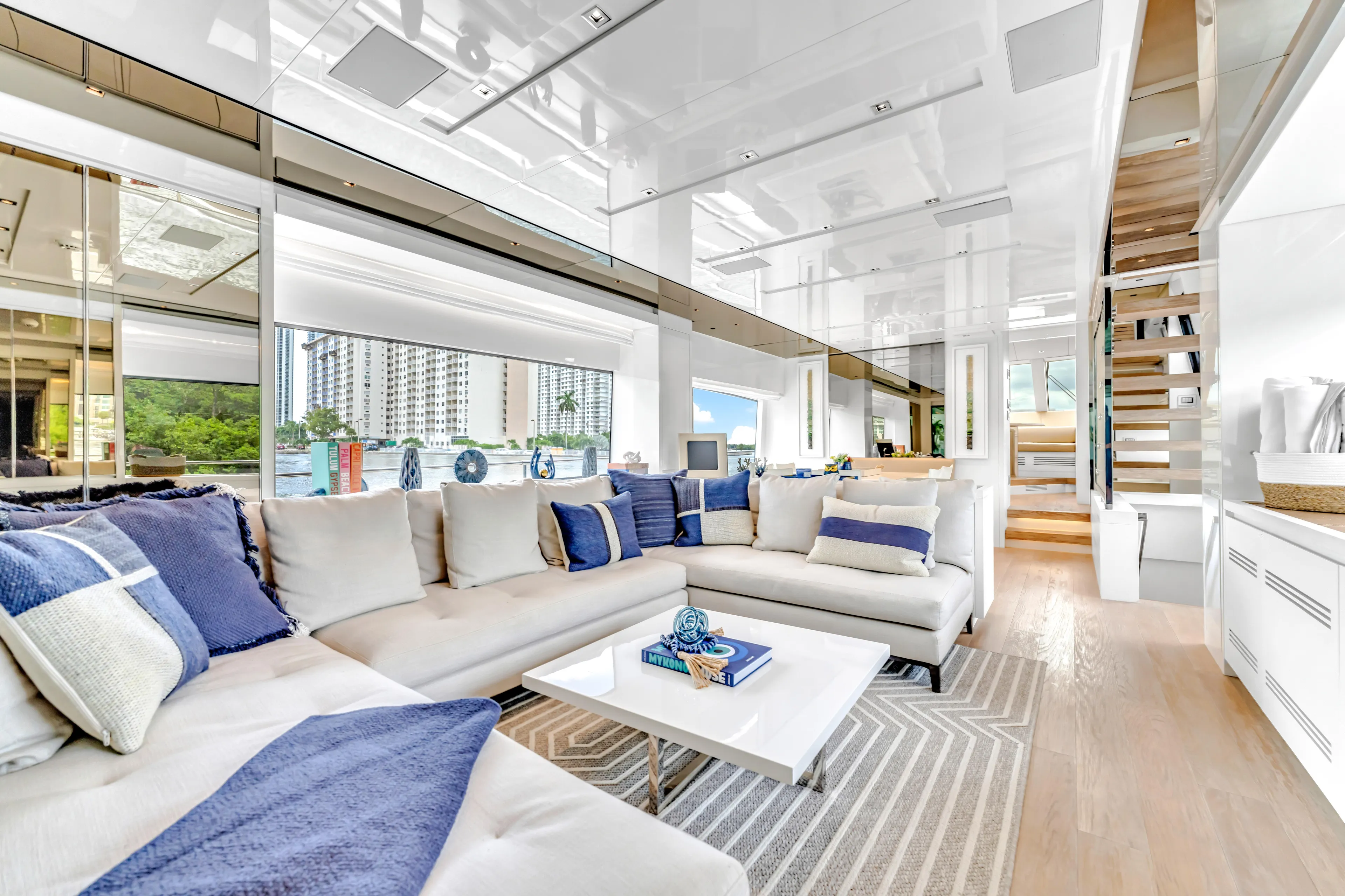 Sand Yacht Photos Pics Luxurious interior of 2018 Sanlorenzo SL78 yacht with modern decor and spacious seating.