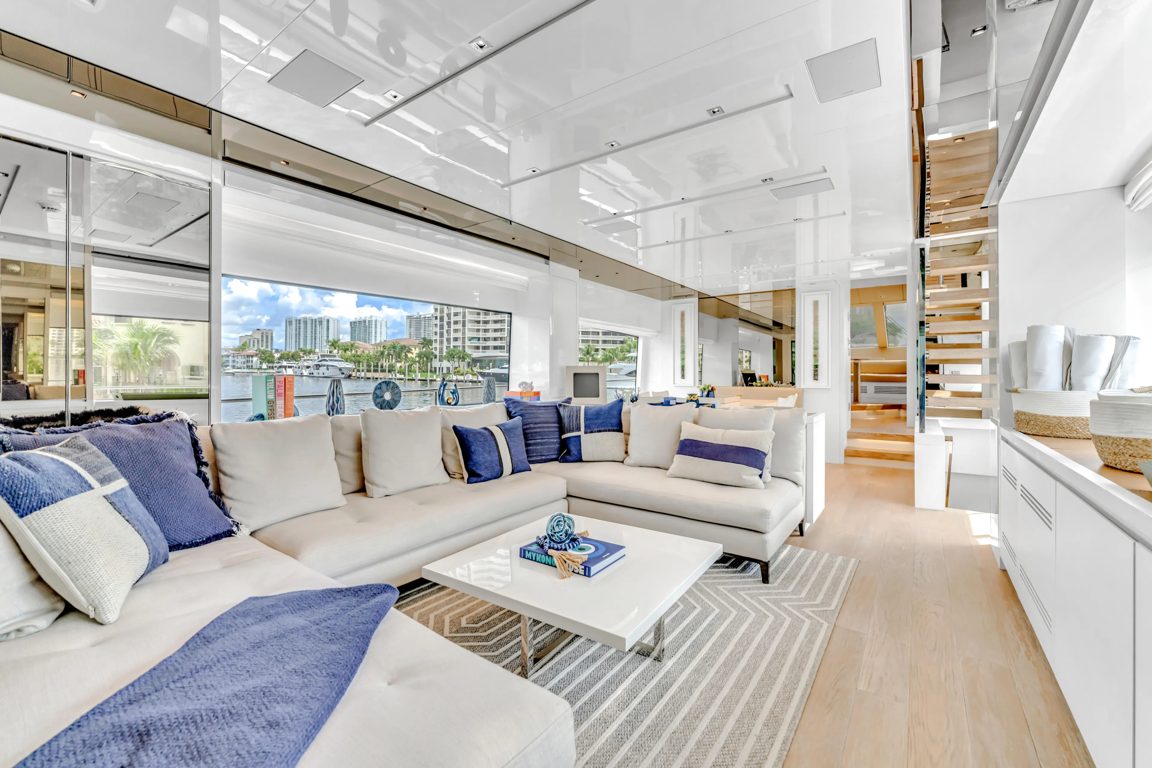 Sand Yacht Photos Pics Luxurious interior of 2018 Sanlorenzo SL78 yacht with modern decor and waterfront view.