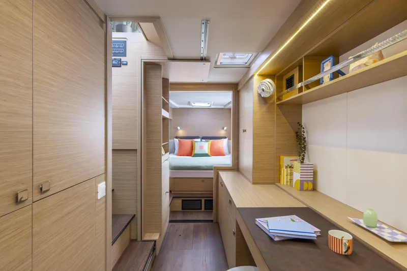  Yacht Photos Pics Luxurious interior of 2025 Lagoon 43 yacht with modern design and cozy bedroom.