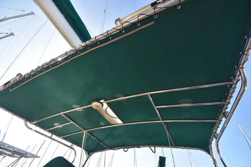 Shibumi Yacht Photos Pics Green canopy on 1995 Island Packet 37 sailboat, viewed from below.