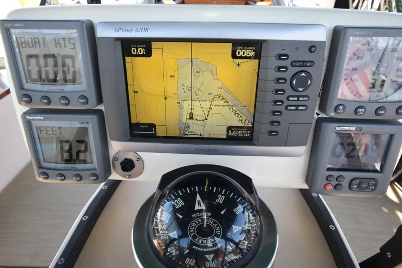 Shibumi Yacht Photos Pics Navigation instruments on a 1995 Island Packet 37 sailboat, featuring GPS and compass.
