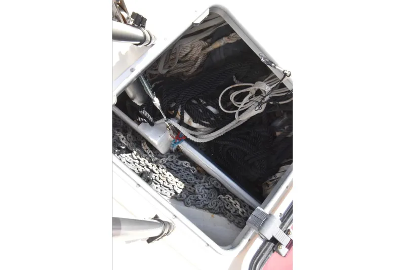 Sweet Dream Yacht Photos Pics Anchor locker of 2005 Island Packet 485 sailboat with ropes and chains.