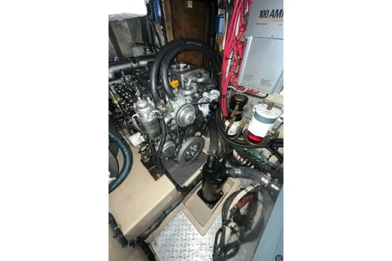 Sweet Dream Yacht Photos Pics Engine room of 2005 Island Packet 485 sailboat, showcasing mechanical components and wiring.