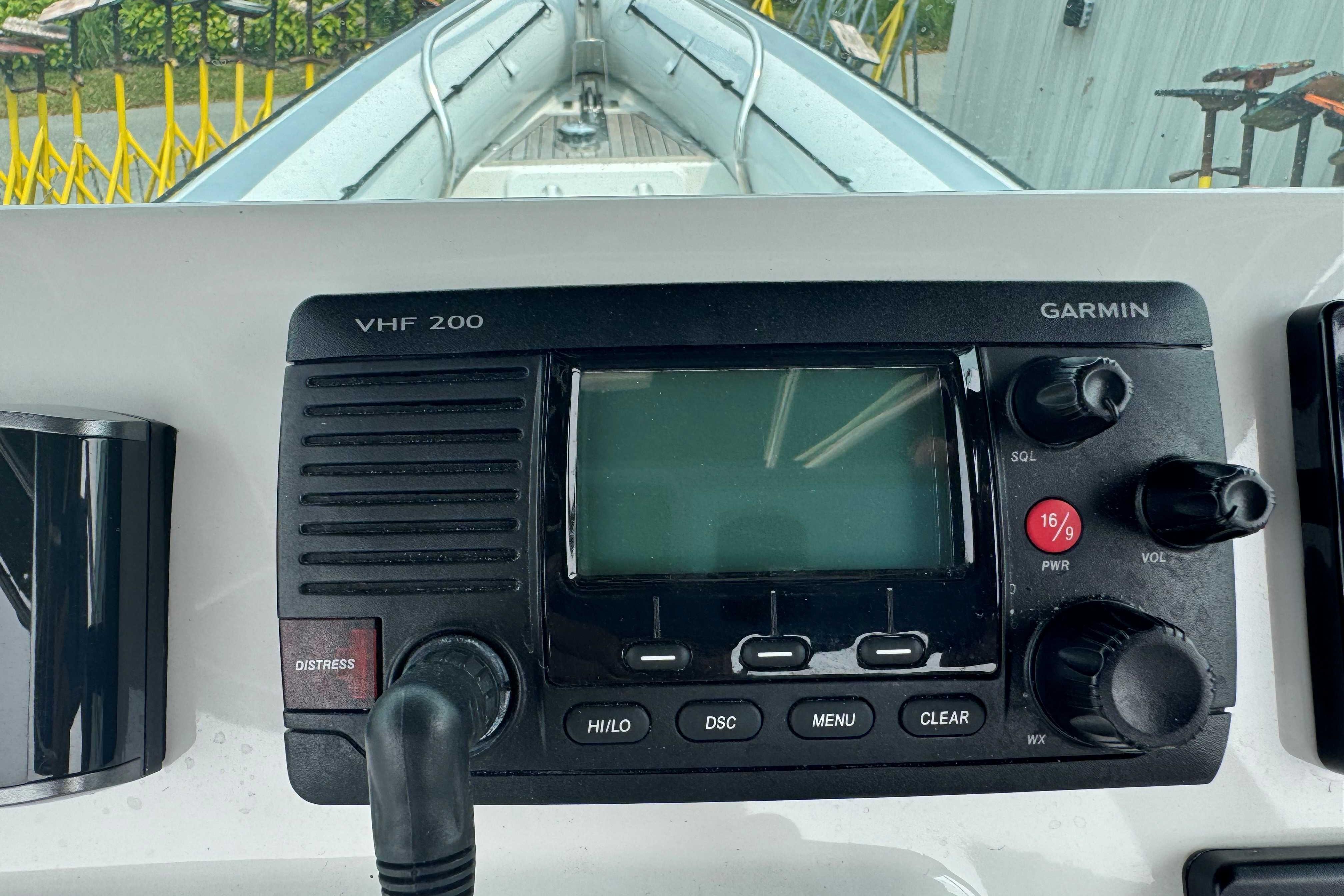 Garmin VHF 200 radio on 2016 Protector 30 Center Console boat dashboard.