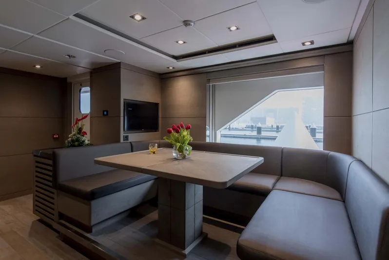 Available 2026 Yacht Photos Pics Luxurious interior of 2026 Majesty 175 yacht with elegant dining area and modern decor.