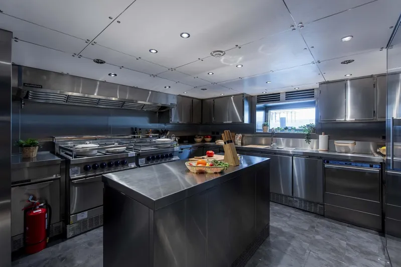 Available 2026 Yacht Photos Pics Modern stainless steel kitchen on 2026 Majesty 175 yacht, featuring professional appliances and sleek design.