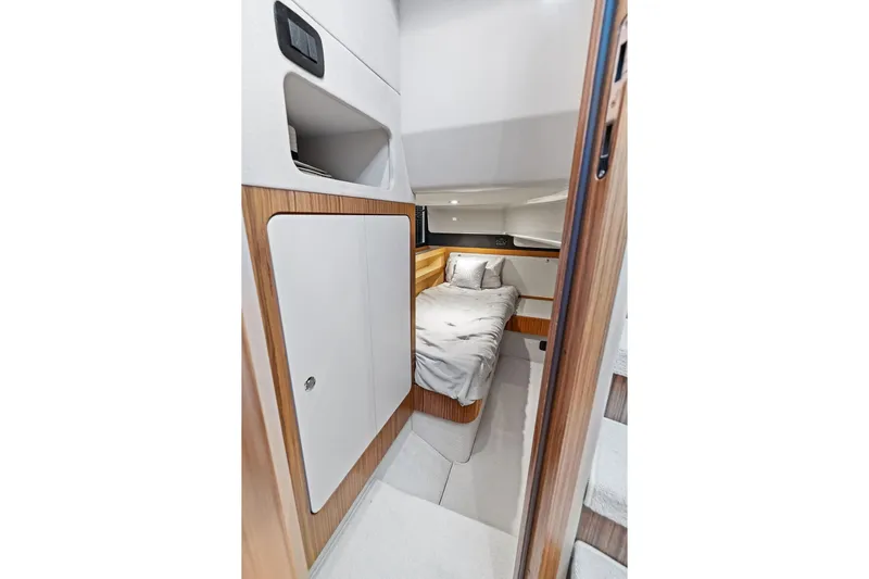  Yacht Photos Pics Azimut Magellano 43 (2021) interior cabin with cozy bed and modern design.