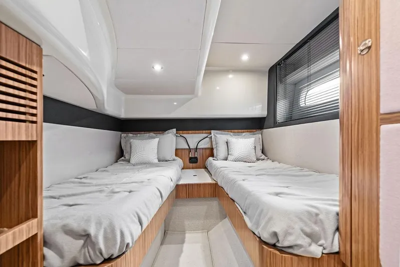  Yacht Photos Pics Interior cabin of 2021 Azimut Magellano 43 yacht with twin beds and modern design.