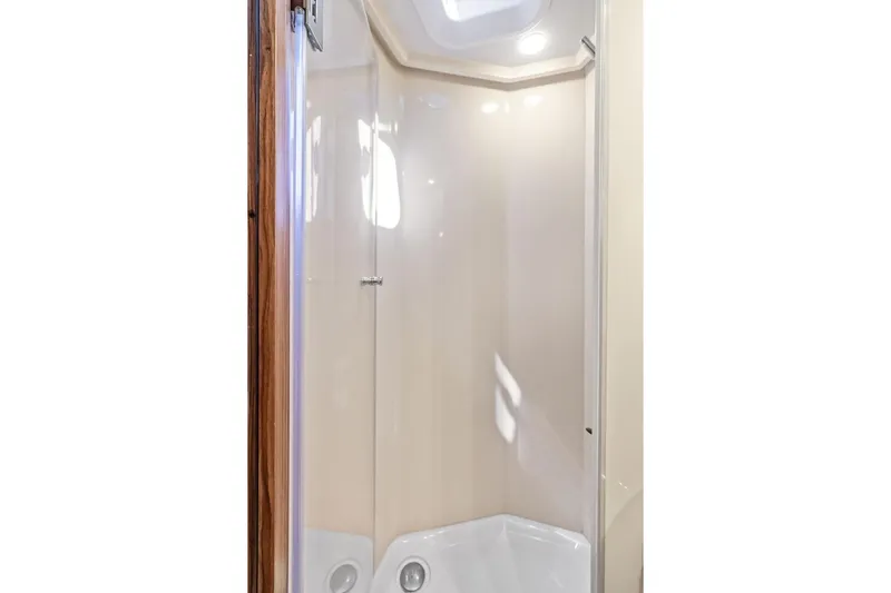  Yacht Photos Pics Shower area in 2021 Azimut Magellano 43 yacht, featuring sleek design and modern fixtures.