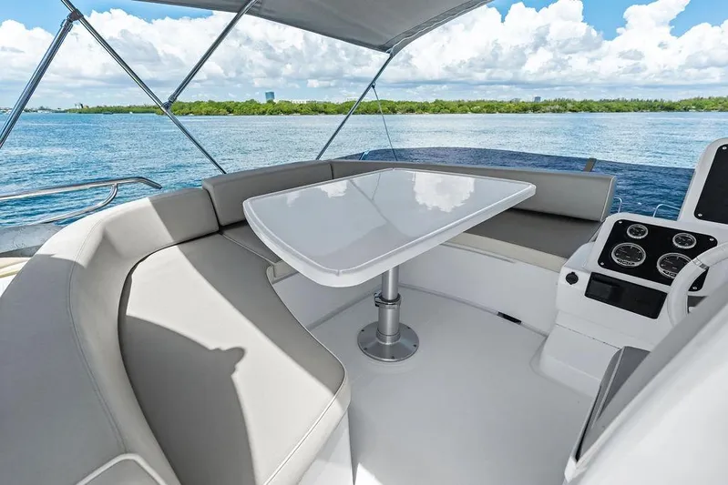  Yacht Photos Pics Luxurious seating area on 2021 Azimut Magellano 43 yacht with ocean view.