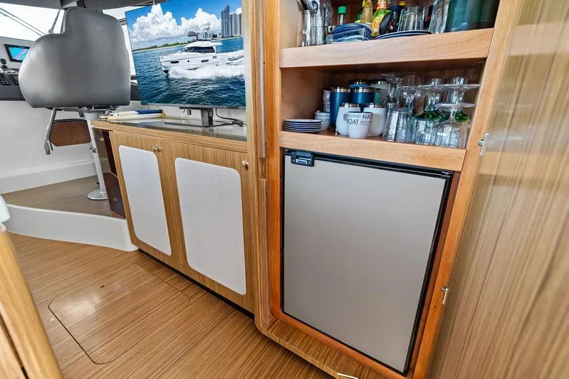  Yacht Photos Pics Interior of 2021 Azimut Magellano 43 yacht with kitchenette and storage.