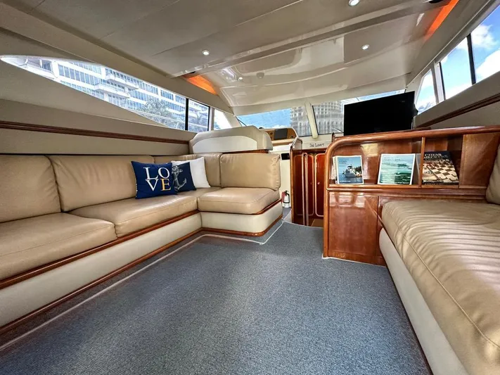  Yacht Photos Pics Luxurious interior of a 1997 Azimut 43 yacht with beige leather seating.