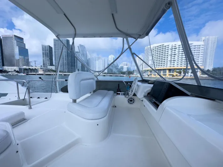  Yacht Photos Pics Azimut 43 yacht interior with city skyline view, 1997 model.