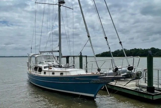 Blue Moon Yacht Photos Pics Sailboat Gozzard 41 RC, 2016 model, docked on a cloudy day.