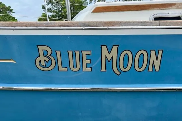 Blue Moon Yacht Photos Pics Blue Gozzard 41 RC sailboat named "Blue Moon," 2016 model, docked outdoors.