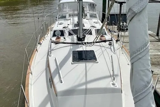 Blue Moon Yacht Photos Pics 2016 Gozzard 41 RC sailboat docked, showcasing deck and mast.