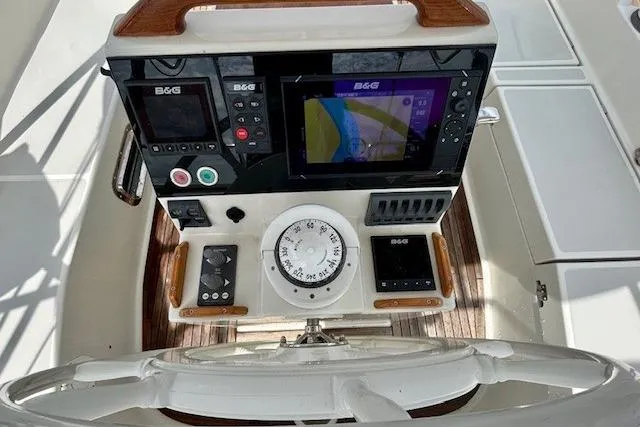 Blue Moon Yacht Photos Pics Helm of 2016 Gozzard 41 RC with navigation instruments and compass.