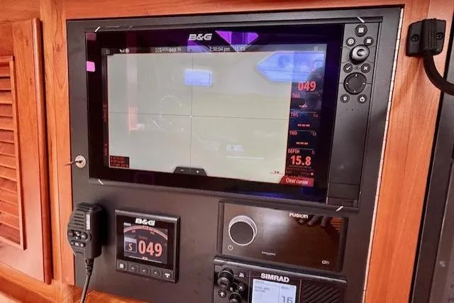 Blue Moon Yacht Photos Pics Navigation equipment on 2016 Gozzard 41 RC sailboat, featuring B&G and Simrad displays.