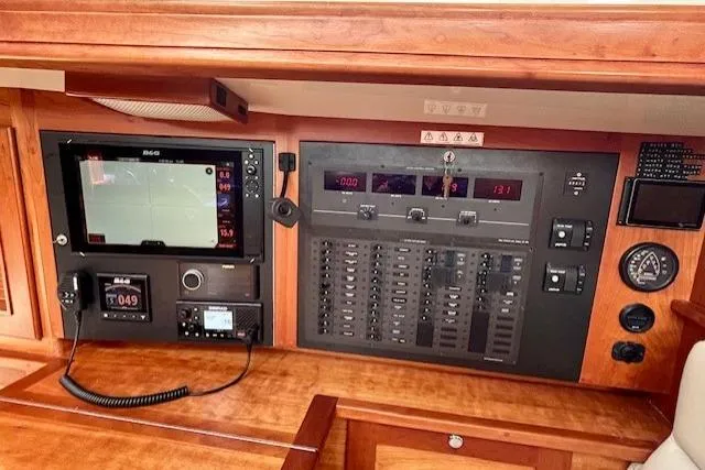 Blue Moon Yacht Photos Pics Control panel of 2016 Gozzard 41 RC yacht with navigation and communication equipment.