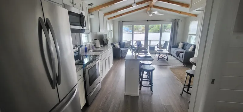  Yacht Photos Pics Modern kitchen and living area in 2020 Destination Yachts 16x45 Condo Series houseboat.