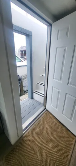  Yacht Photos Pics Open door view from 2020 Destination Yachts 16x45 Condo Series, showing exterior steps.