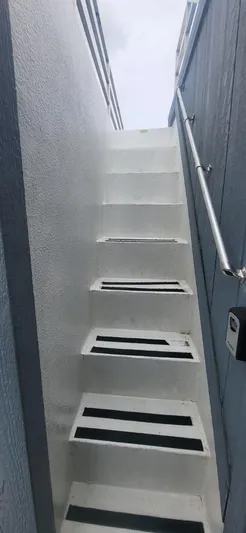  Yacht Photos Pics White staircase on 2020 Destination Yachts 16x45 Condo Series boat.