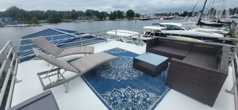  Yacht Photos Pics Rooftop deck of 2020 Destination Yachts 16x45 Condo Series with lounge chairs and sofa.