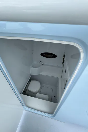 35-261 Yacht Photos Pics 2025 Contender 35 ST boat interior bathroom with compact design and modern amenities.