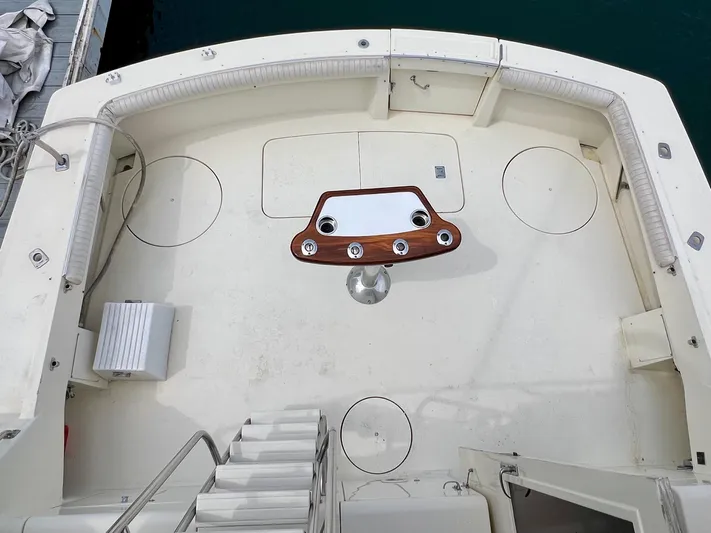 White Shark Yacht Photos Pics 1988 Hatteras 48 Convertible yacht deck with fishing station and seating.