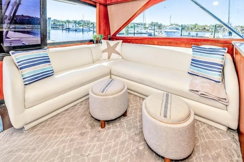 Obsidian Yacht Photos Pics Luxurious interior of 1991 Ocean Yachts 53 Super Sport with plush seating and nautical decor.
