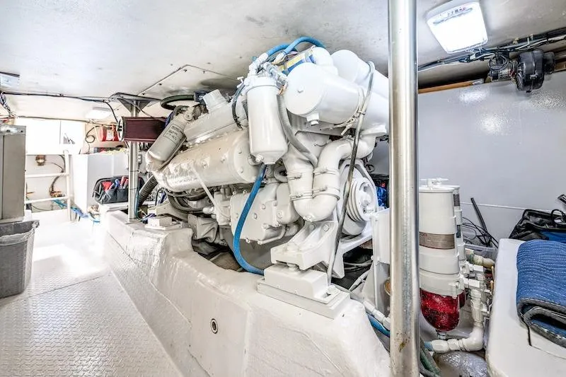 Obsidian Yacht Photos Pics Engine room of 1991 Ocean Yachts 53 Super Sport, showcasing a powerful marine engine.