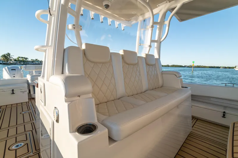 Liberado Yacht Photos Pics Luxurious seating on 2018 HCB 53 Suenos RXV boat with scenic water view.