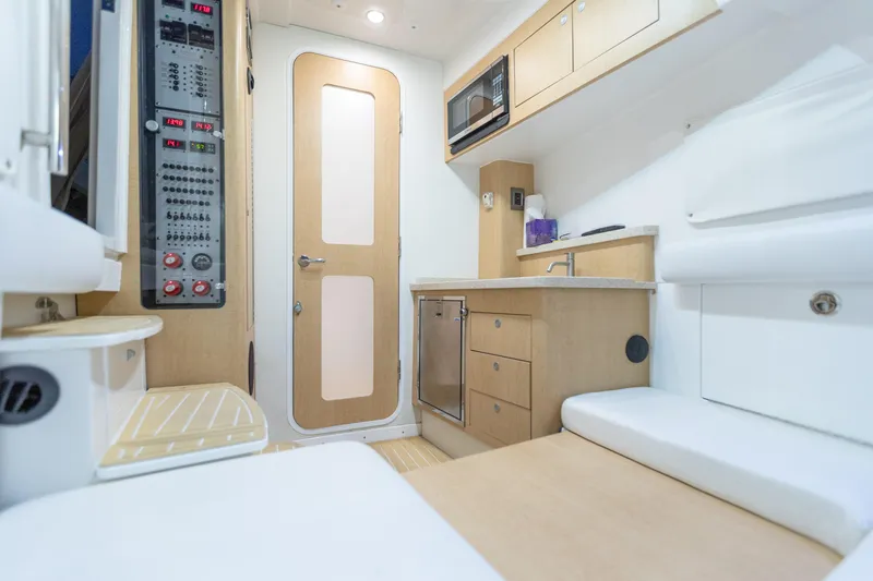 Liberado Yacht Photos Pics 2018 HCB 53 Suenos RXV interior with modern kitchen and control panel.