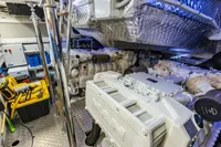 Engine room of 2023 Pershing 7X yacht, featuring advanced machinery and equipment.