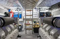 Engine room of 2023 Pershing 7X yacht, featuring advanced machinery and equipment.