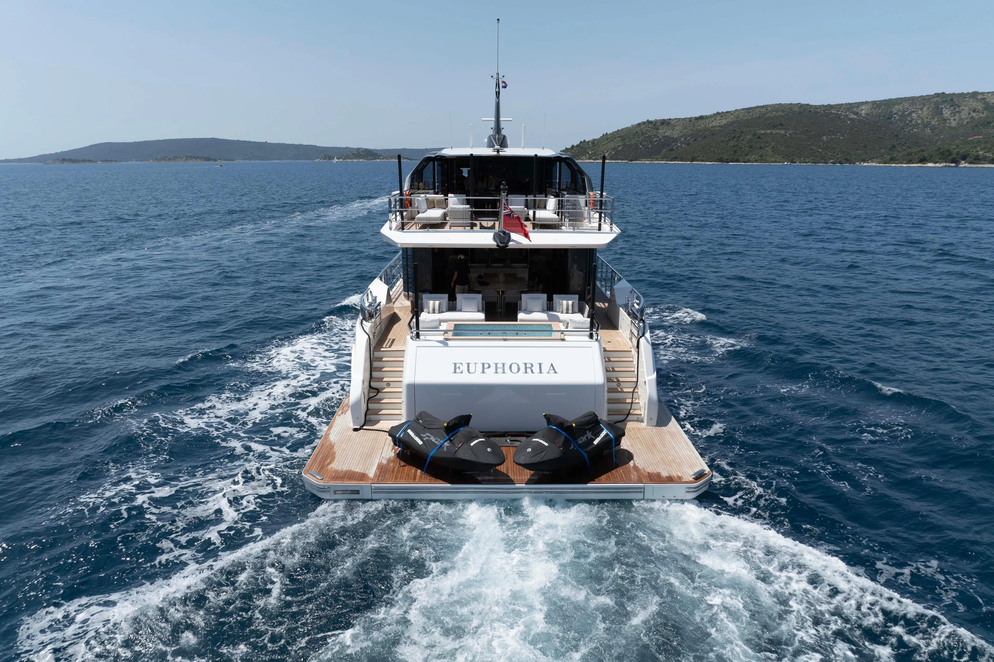 Luxury yacht "Euphoria" cruising, Alpha 100 Squalo Co Ownership, 2025 model, on open sea.