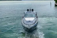 2015 Pershing 70 yacht cruising on calm waters.