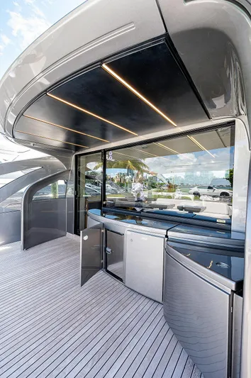 Andiamo Yacht Photos Pics Luxurious 2015 Pershing 70 yacht deck with sleek design and modern amenities.