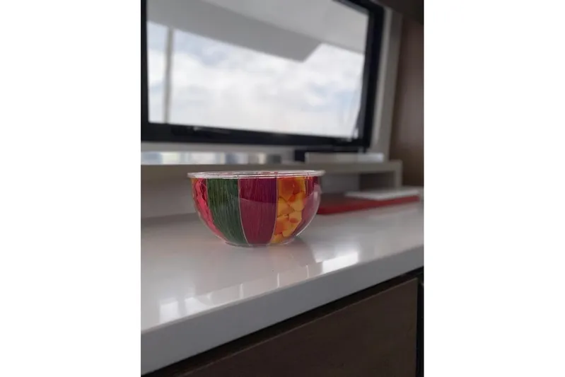 Nia Yacht Photos Pics Colorful bowl on countertop near window, Bali 4.6, 2022 model.