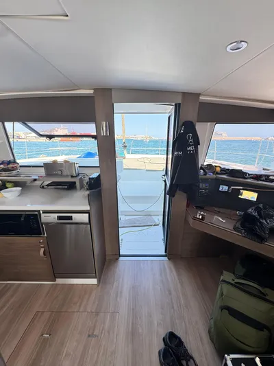 Nia Yacht Photos Pics Interior view of a 2022 Bali 4.6 yacht with ocean backdrop.