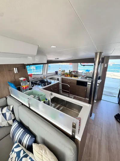 Nia Yacht Photos Pics Modern kitchen interior on a 2022 Bali 4.6 yacht, featuring sleek design and ocean view.