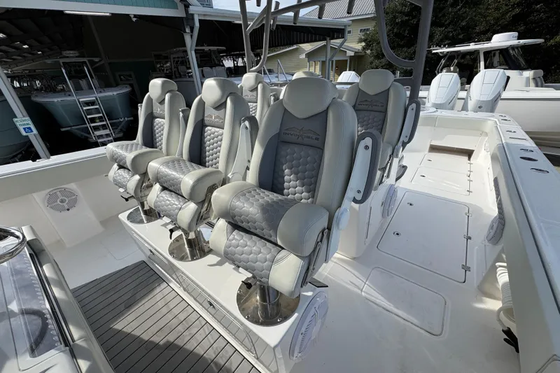  Yacht Photos Pics 2023 Invincible 46 Catamaran interior with luxurious seating and modern design.
