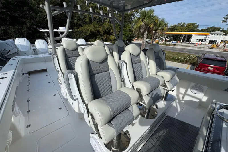  Yacht Photos Pics 2023 Invincible 46 Catamaran interior with luxurious seating and modern design.