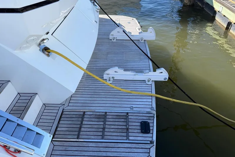 Dream Yacht Photos Pics 2019 Galeon 470 Sky yacht deck with mooring lines and water hose.