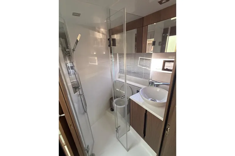 Dream Yacht Photos Pics Modern bathroom in 2019 Galeon 470 Sky yacht with glass shower and sleek sink.