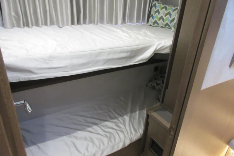 Dream Yacht Photos Pics Bunk beds in 2019 Galeon 470 Sky yacht cabin with patterned pillows.