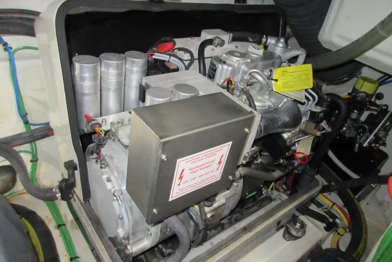 Dream Yacht Photos Pics Engine compartment of 2019 Galeon 470 Sky yacht, showcasing mechanical components and wiring.
