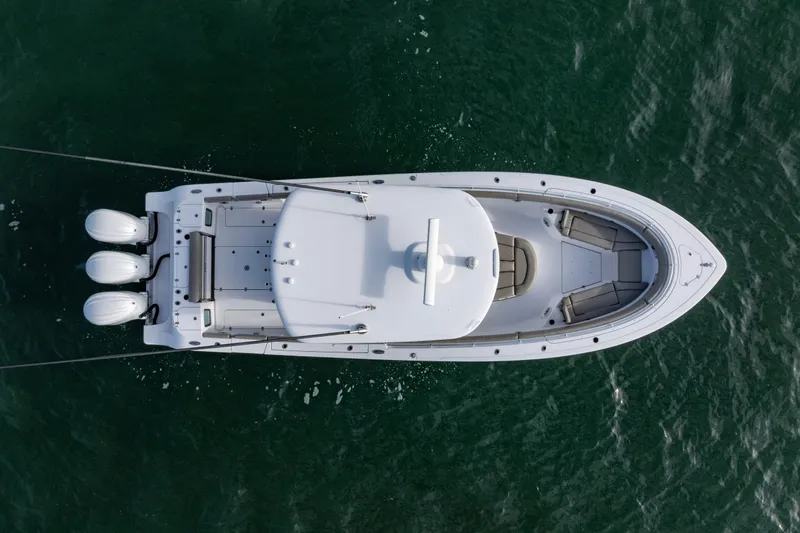 What A County Yacht Photos Pics Overhead view of 2022 Sportsman Open 352 Center Console boat on water.